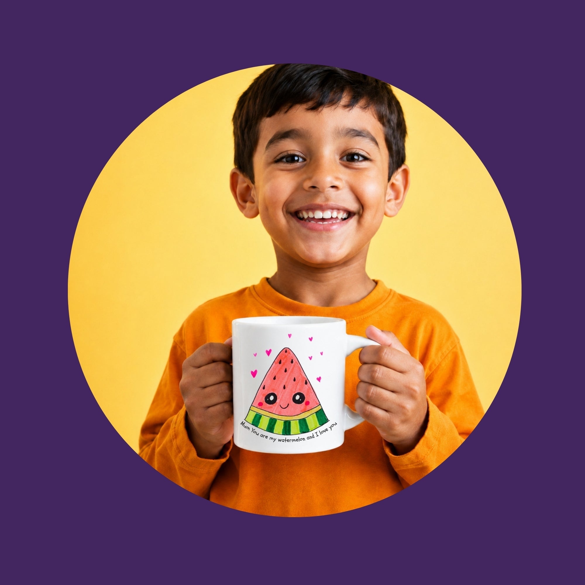 Child holding a personalised mug featuring colourful artwork