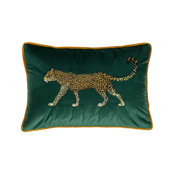 Green velvet sofa cushion showcasing golden leopard pattern