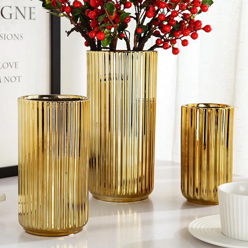 Elegant brass ceramic vase with striped detailing