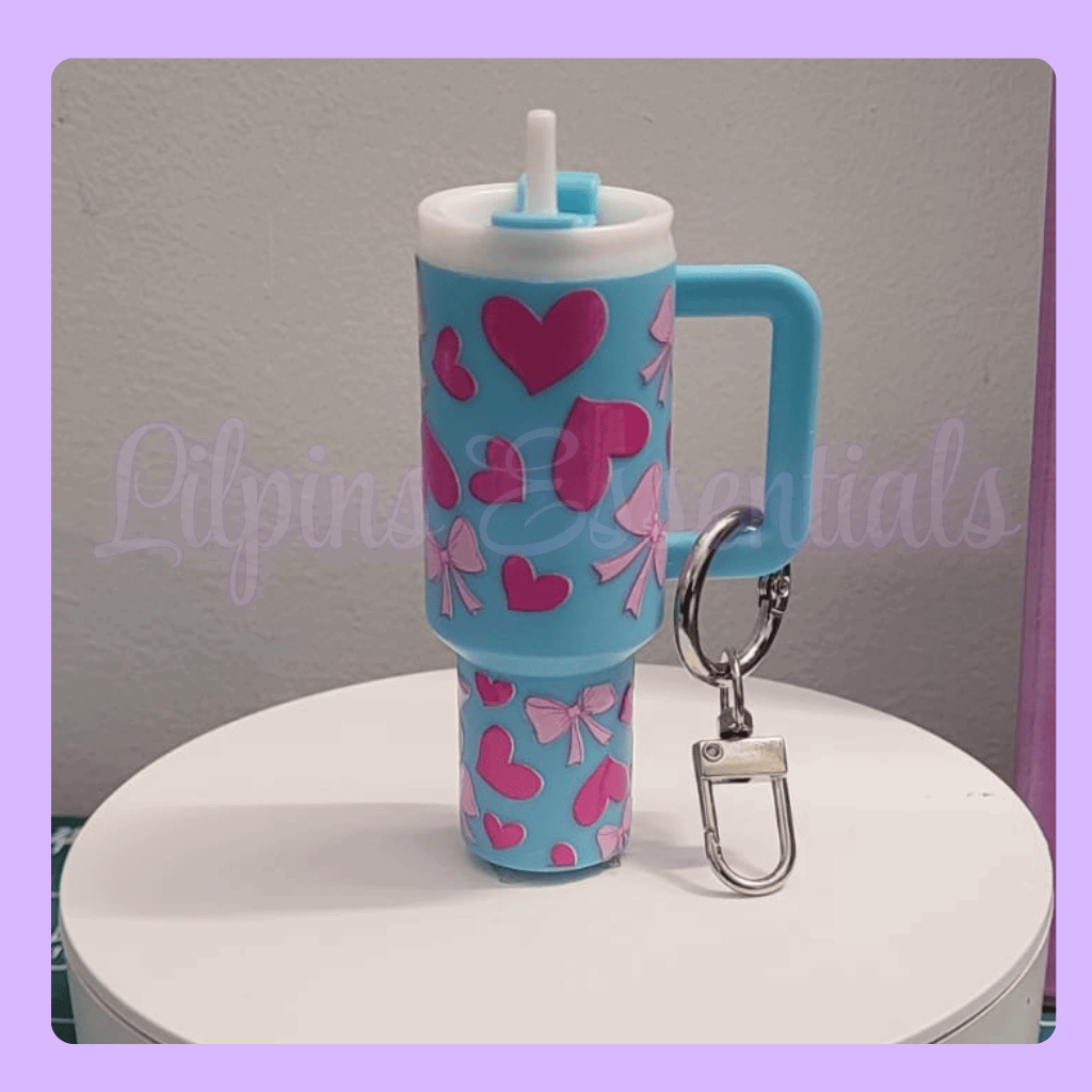 Blue mini stanley tumbler keychain with pink hearts and bows