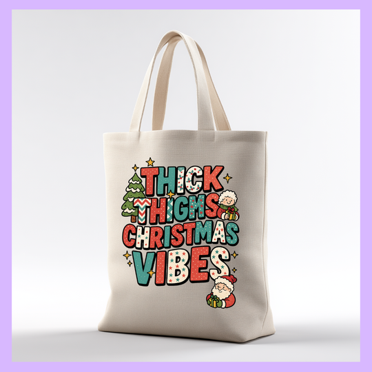 Tote bag with 'Thick Thighs Christmas Vibes' text and festive graphics