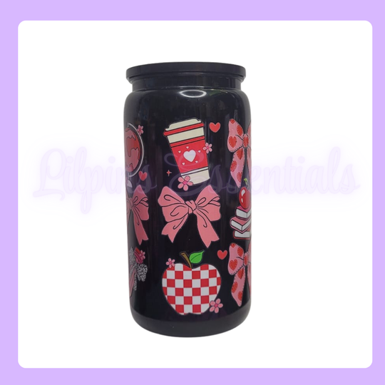 Black 16oz Plastic Tumbler with pink and red designs or ribbon, apple, books and cups