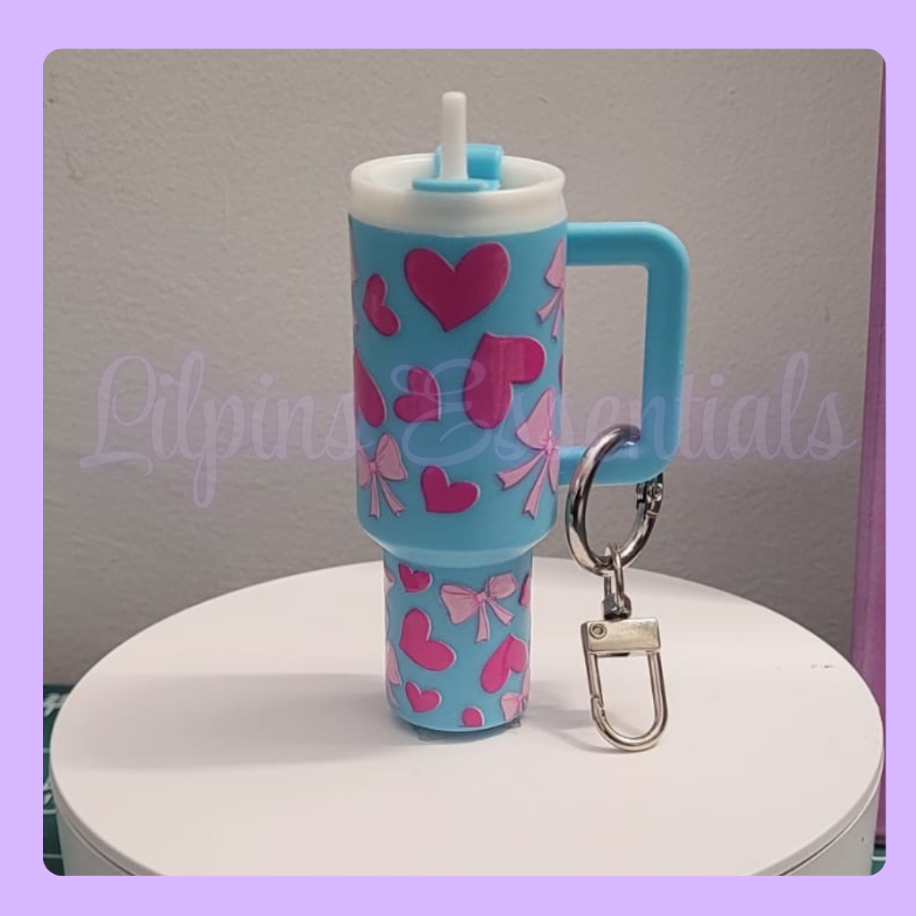 Blue mini stanley tumbler keychain with pink hearts and bows