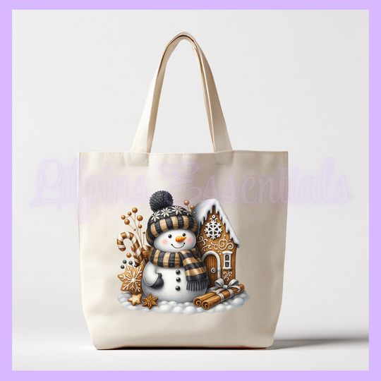 Tote bag with a snowman and gingerbread house design 