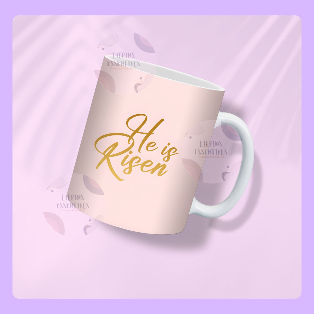 christian easter mug with floral cross design and he is risen message