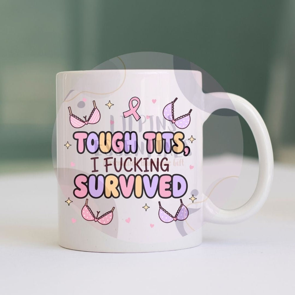 Bold breast cancer survivor mug with strong-language design