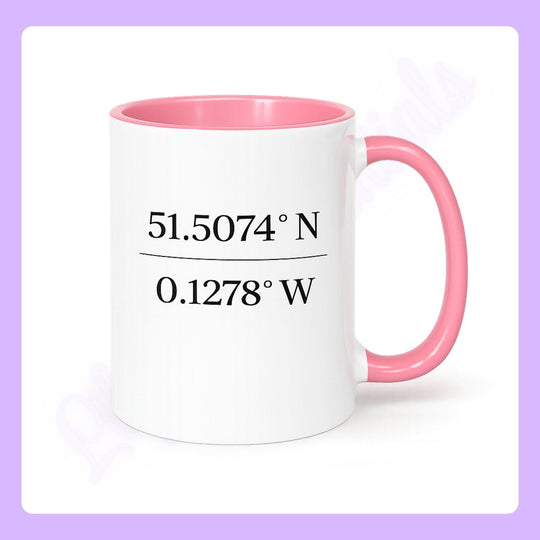 White mug with pink handle and interior, featuring coordinates on a light purple background