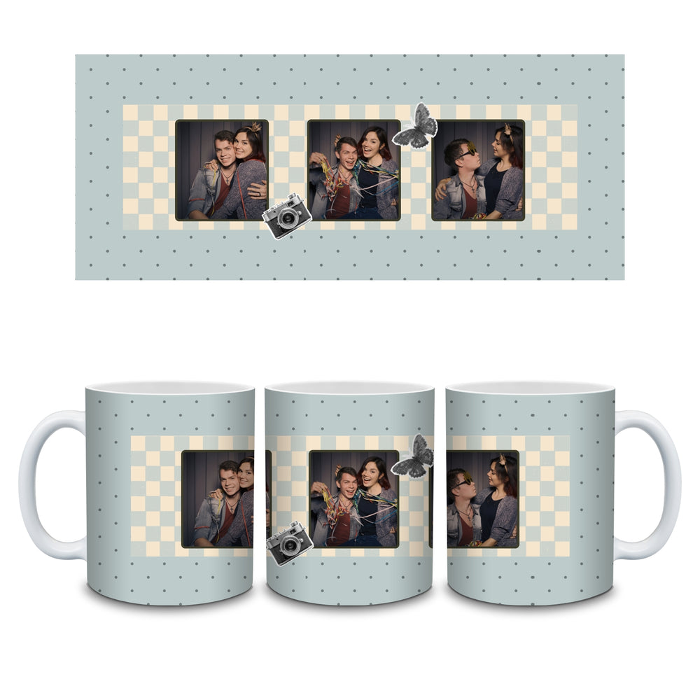 Personalised photo booth mug full wrap showing three photo strip, dusty-blue checkerboard, camera and butterfly details